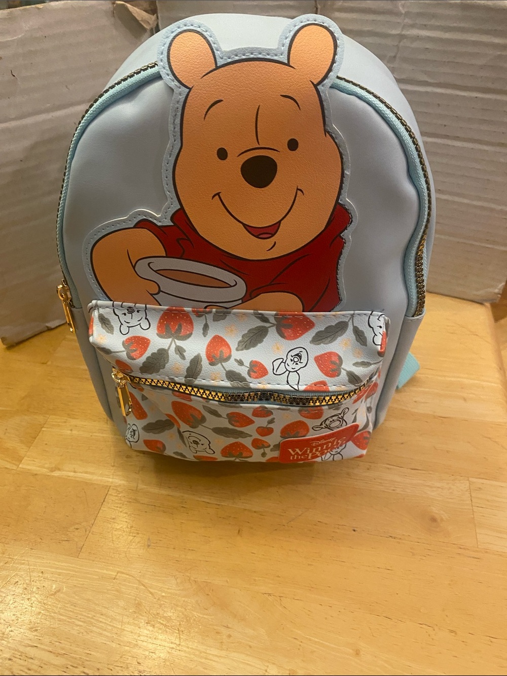 Disney Light Blue Winnie the Pooh Mini Backpack with Orange Accents